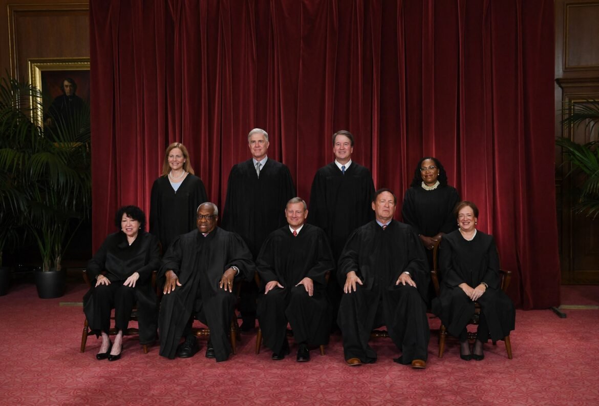 Photo: The judges of the Supreme Court pose for their official photo in the Supreme Court of Washington, DC, on October 7, 2022. 