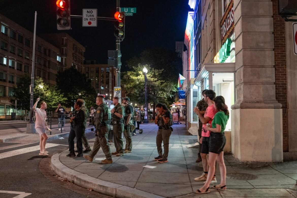 PHOTO: FBI and Border Patrol officers speak with Sean Charles Dunn, August 10, 2025, in Washington, DC