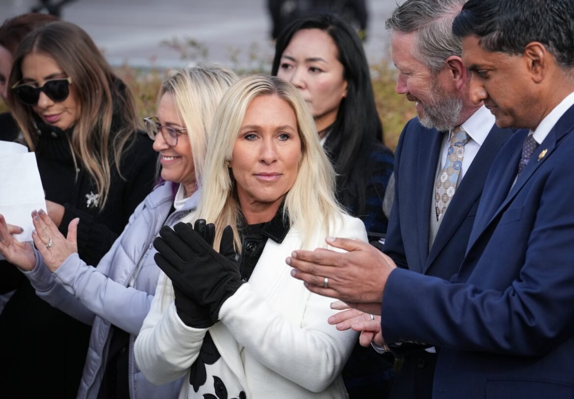 Rep. Marjorie Taylor Greene says she will resign from Congress in January

