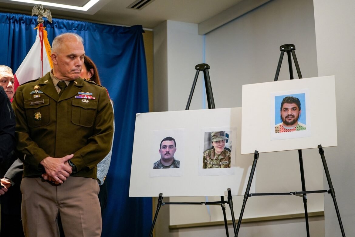 PHOTO: Brigadier General Leland D. Blanchard II looks at photos of two National Guard members who were shot along with a photo of a suspect, Afghan national Rahmanullah Lakanwal, at a news conference in Washington, DC, Nov. 27, 2025. 